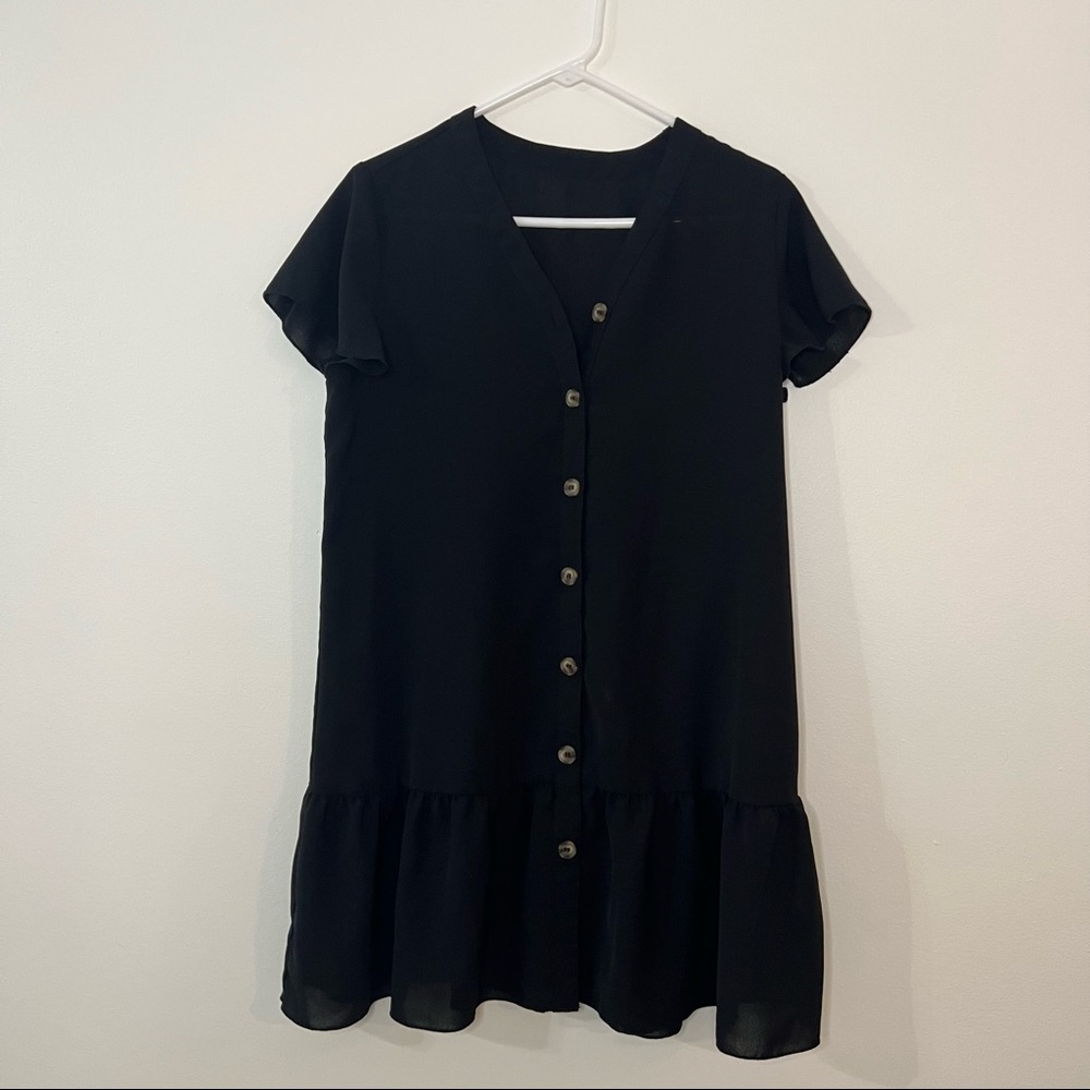 Black babydoll style beach cover up.